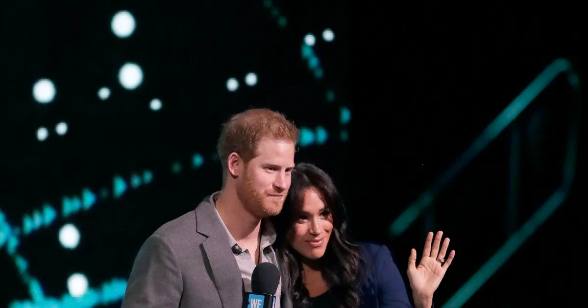 Prince Harry Surprises WE Day Crowd By Bringing Meghan Markle On Stage