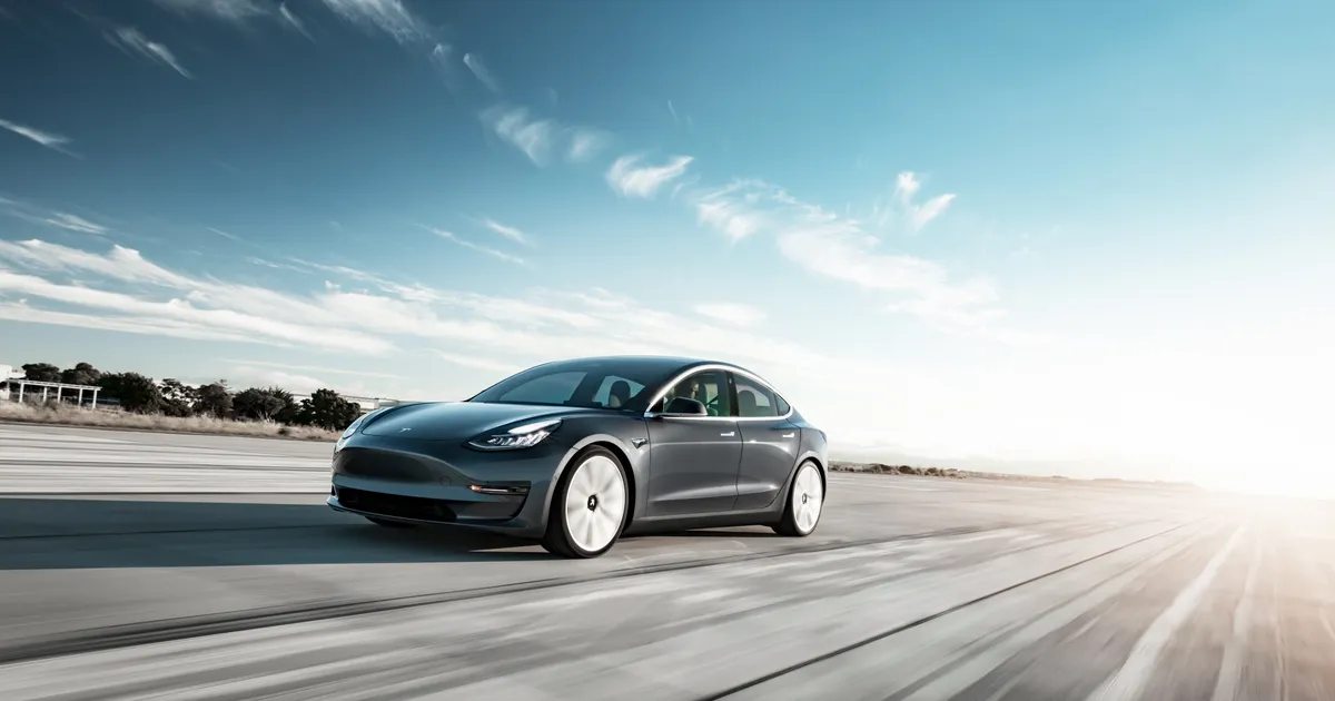 Tesla speeding down the highway