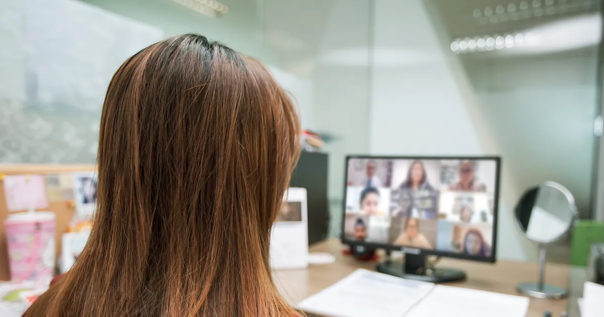 Woman using Microsoft Teams for virtual meeting