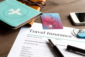 travel insurance papers and passport