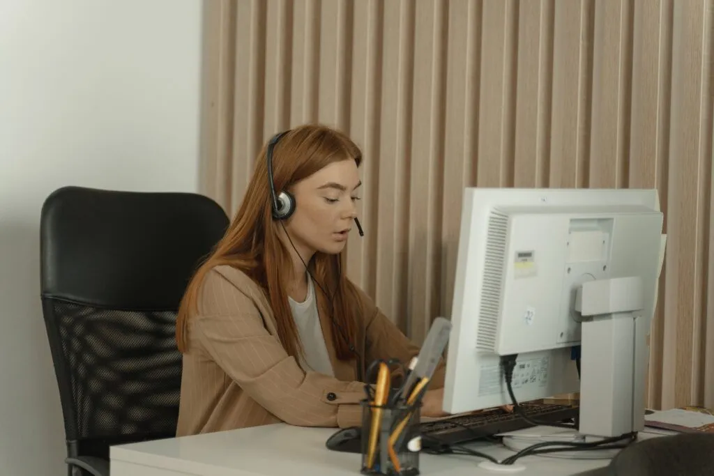 dispatcher on computer and headset