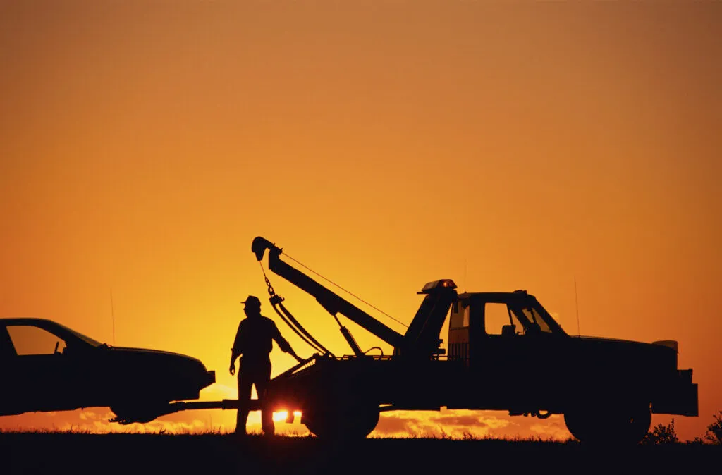 tow truck at sunset
