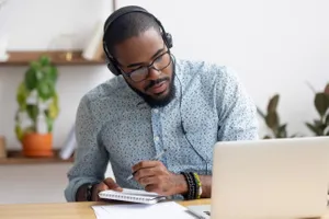 man learning on computer