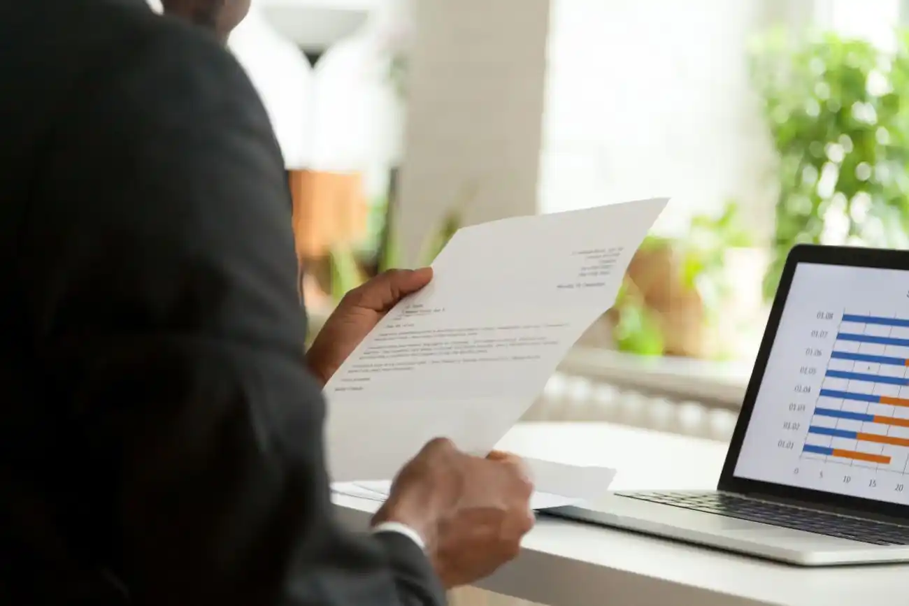 Man Looking at Cover Letter