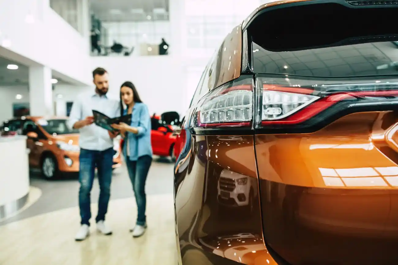 Couple Car Shopping at Dealership