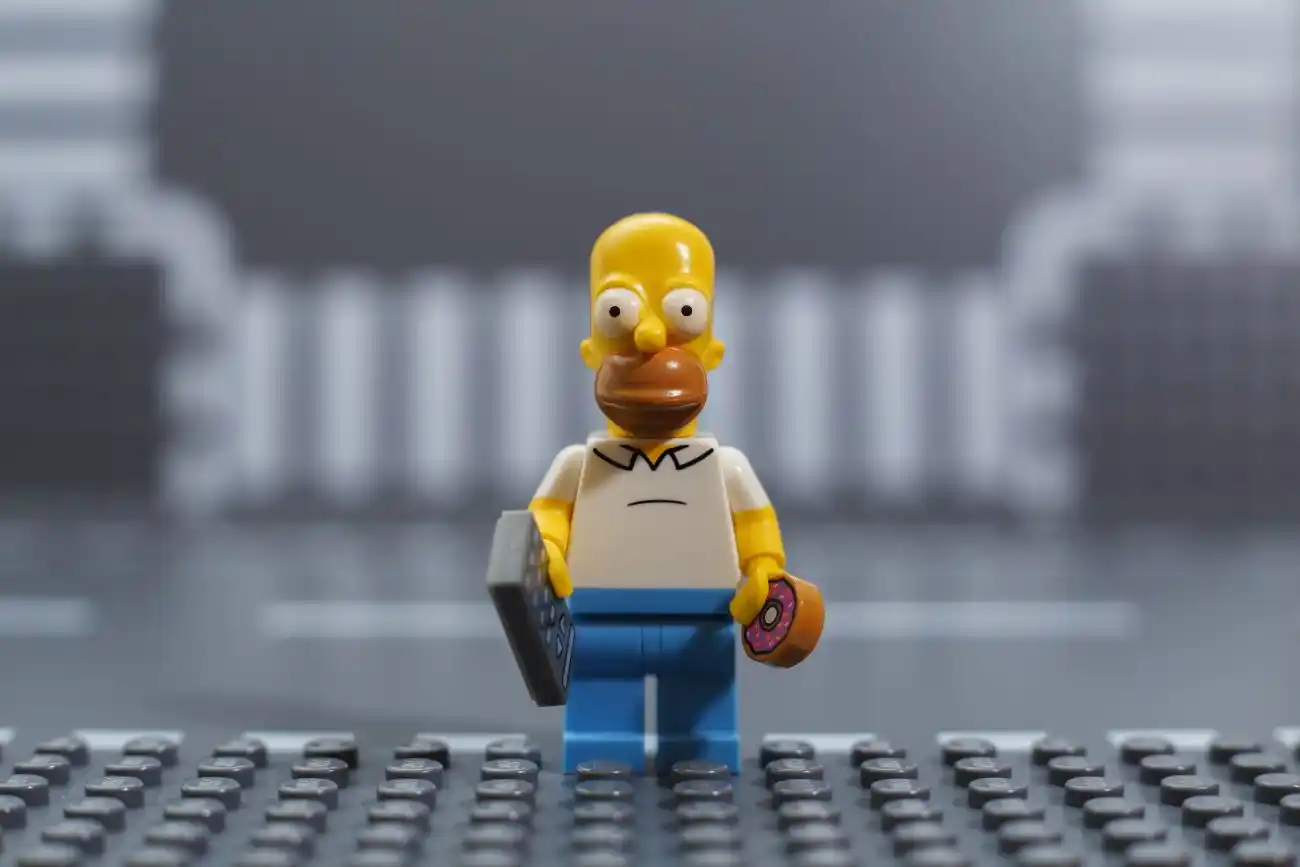 Homer Simpson with Donut and Calculator