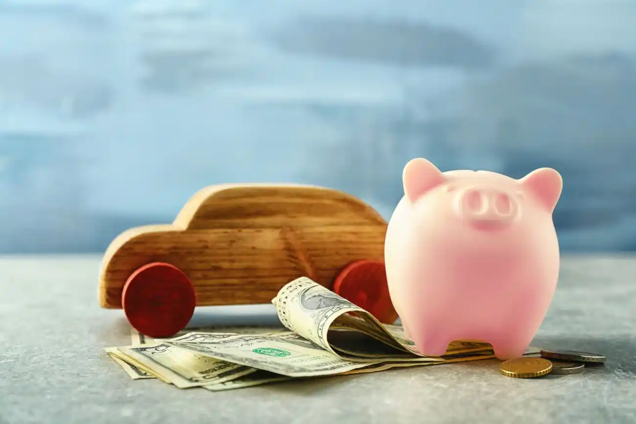 Piggy Bank and Cash by Car