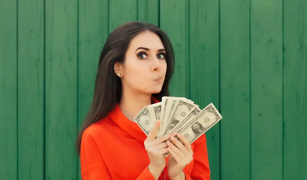 Woman with Cash in Hand