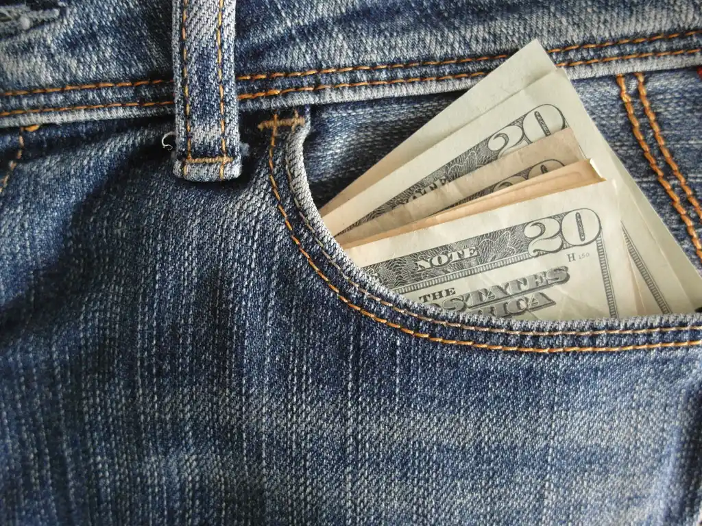 Jean Pocket Stuffed with Cash