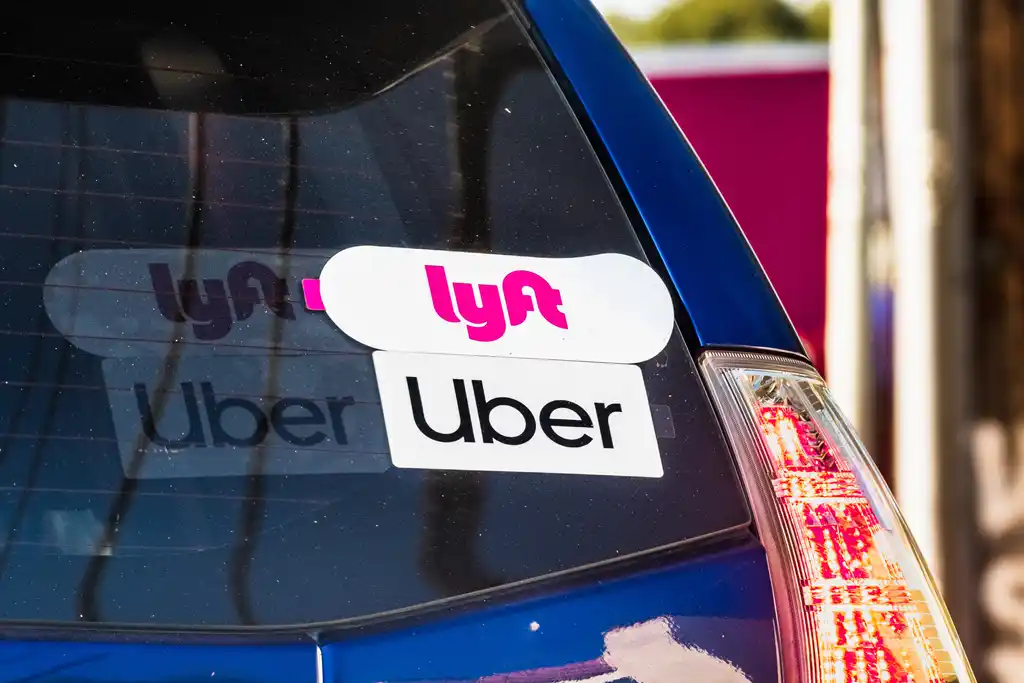 Car with Uber and Lyft Sticker on it