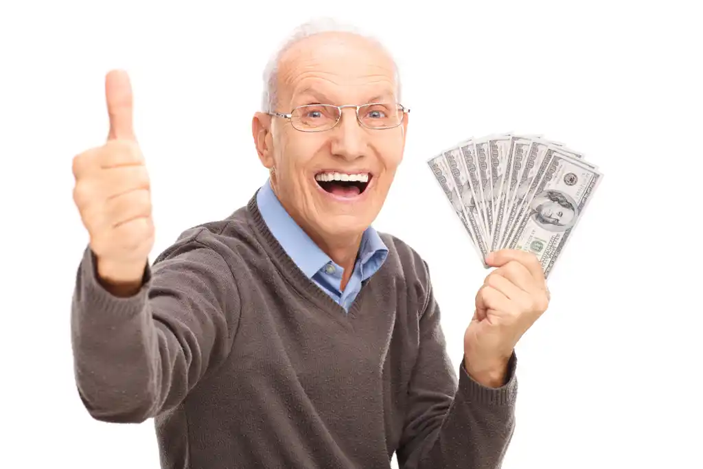 Man Celebrating Making Money with Cash in Hand