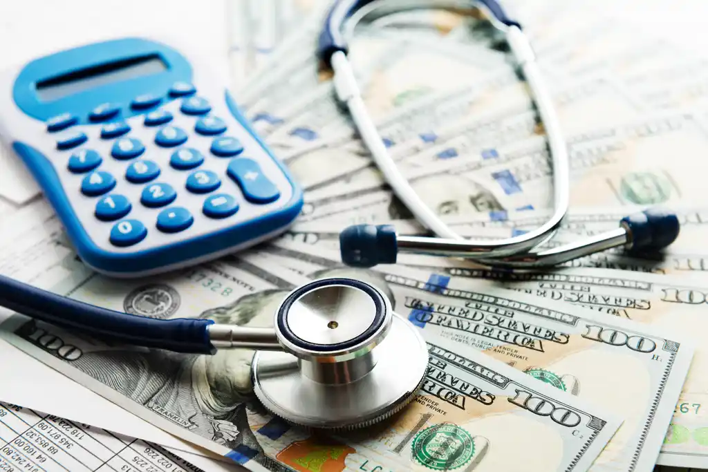 Money with Healthcare Stethoscope & Calculator