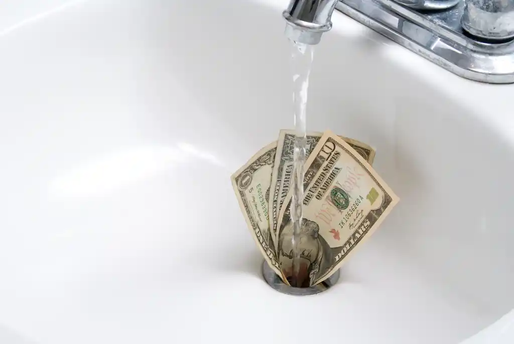 Money Down a Sink Drain