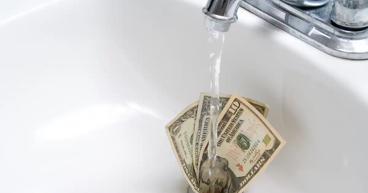 Money Down a Sink Drain