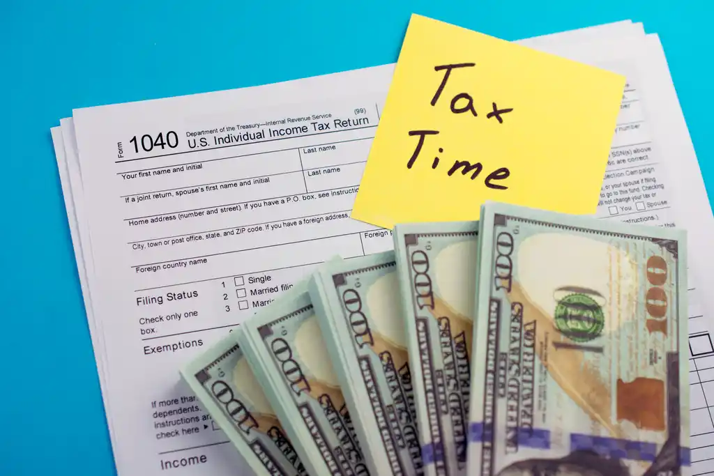 Tax Form 1040 Under Cash Stacks