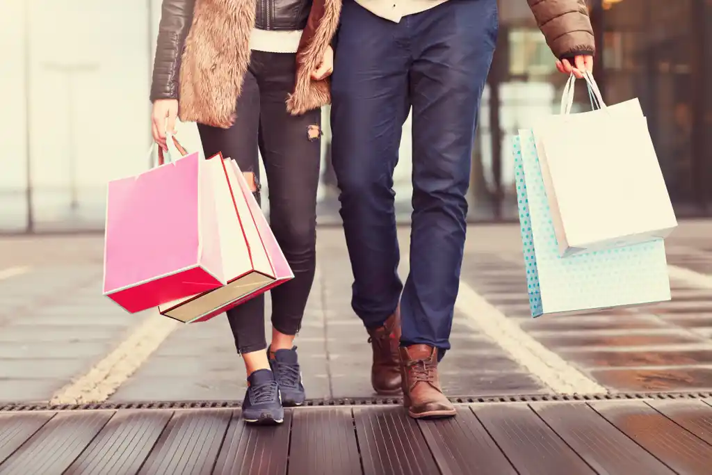 Couple with Shopping Bags at Retailer