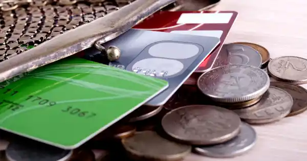 Open Wallet Spilling Credit Cards and Coins
