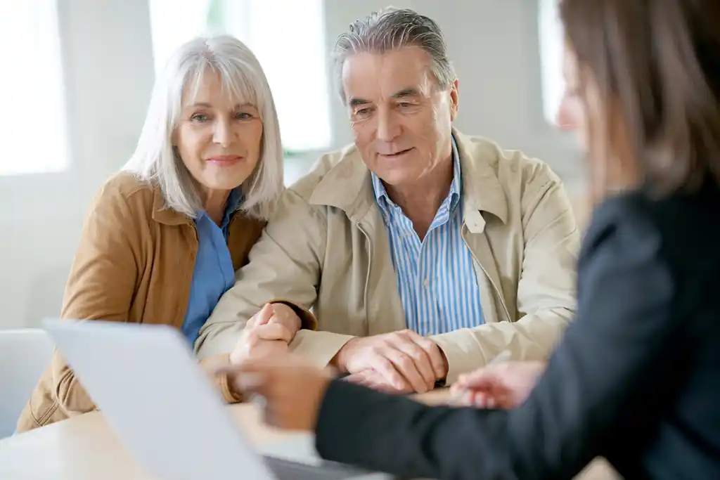 Retiring Couple Discussing Finances with Professional