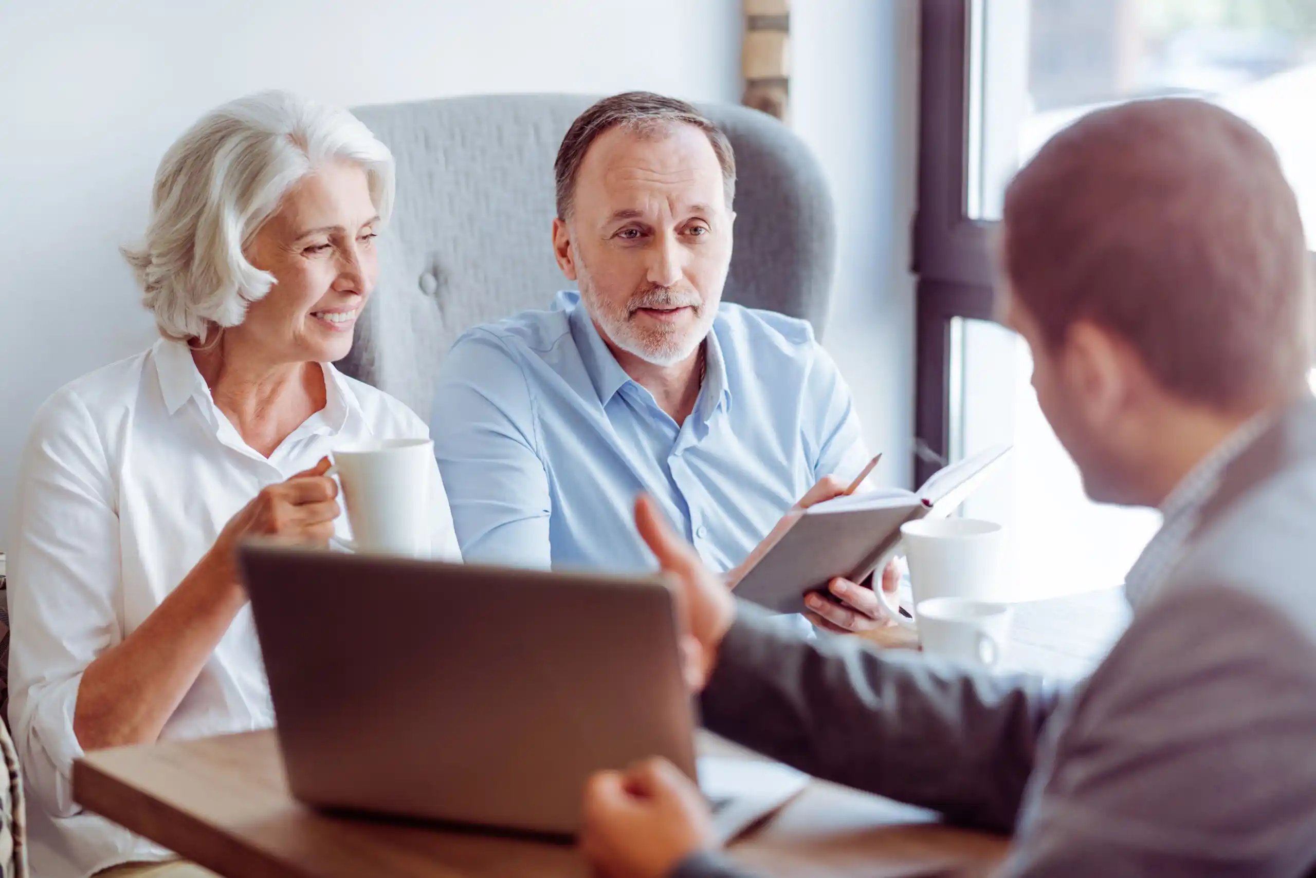 Older Couple Discussing Finances with Advisor