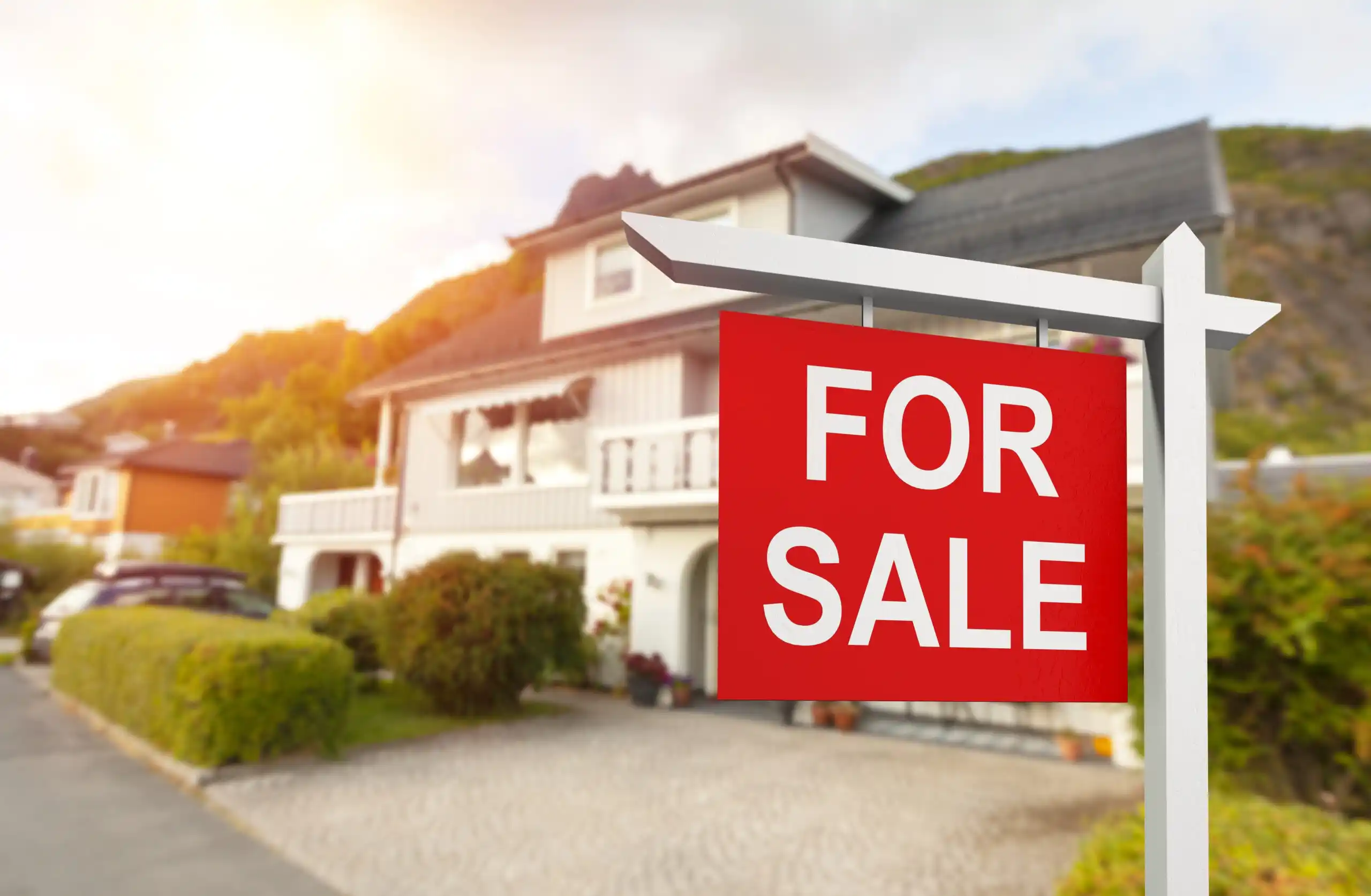 House with Red For Sale Sign