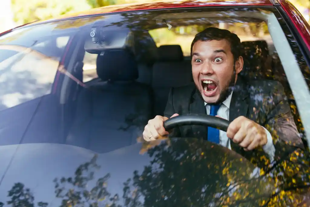 Guy Yelling Driving Car