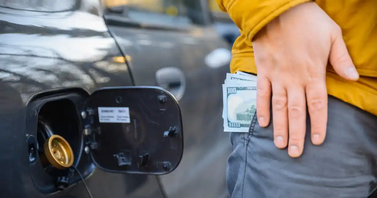 Cash in Pocket by Car Gas Cap
