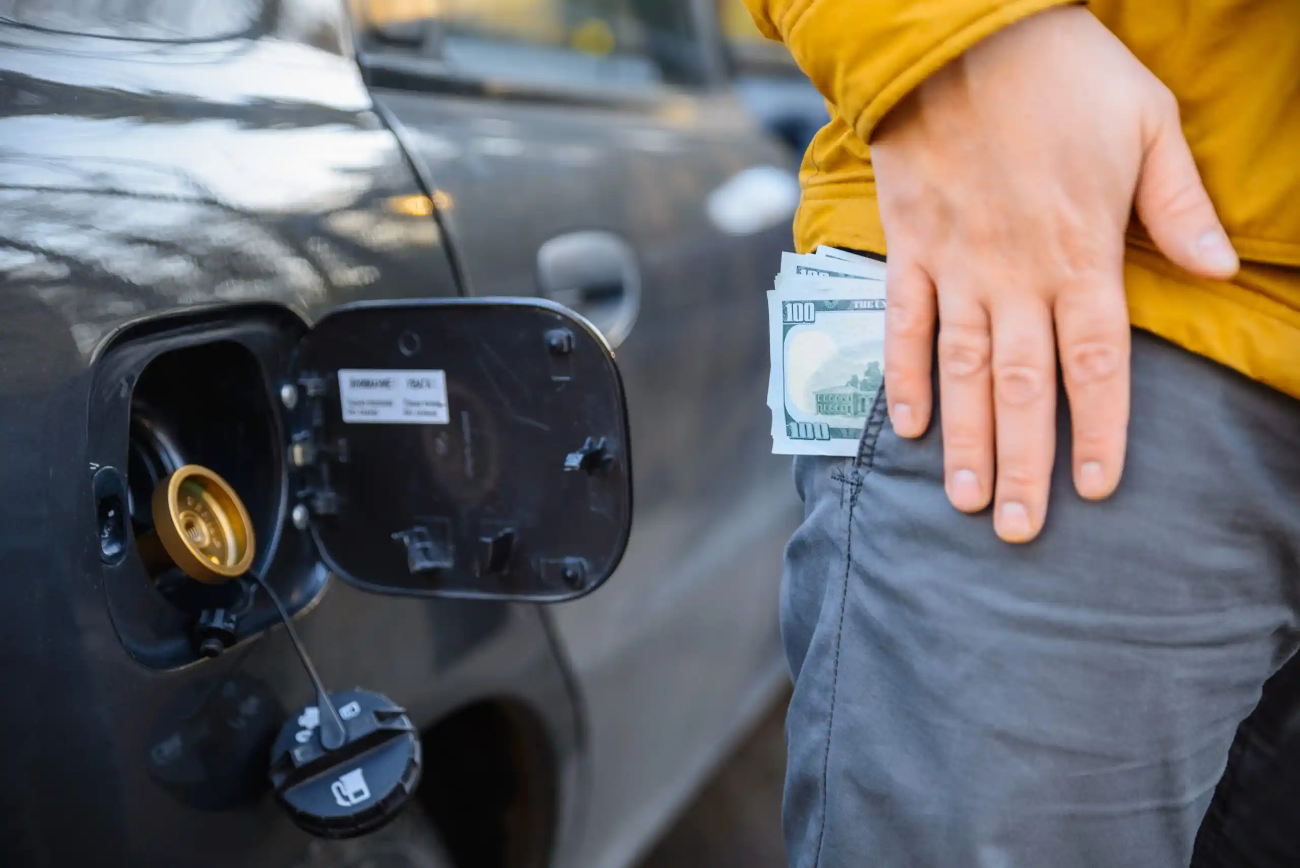 Cash in Pocket by Car Gas Cap