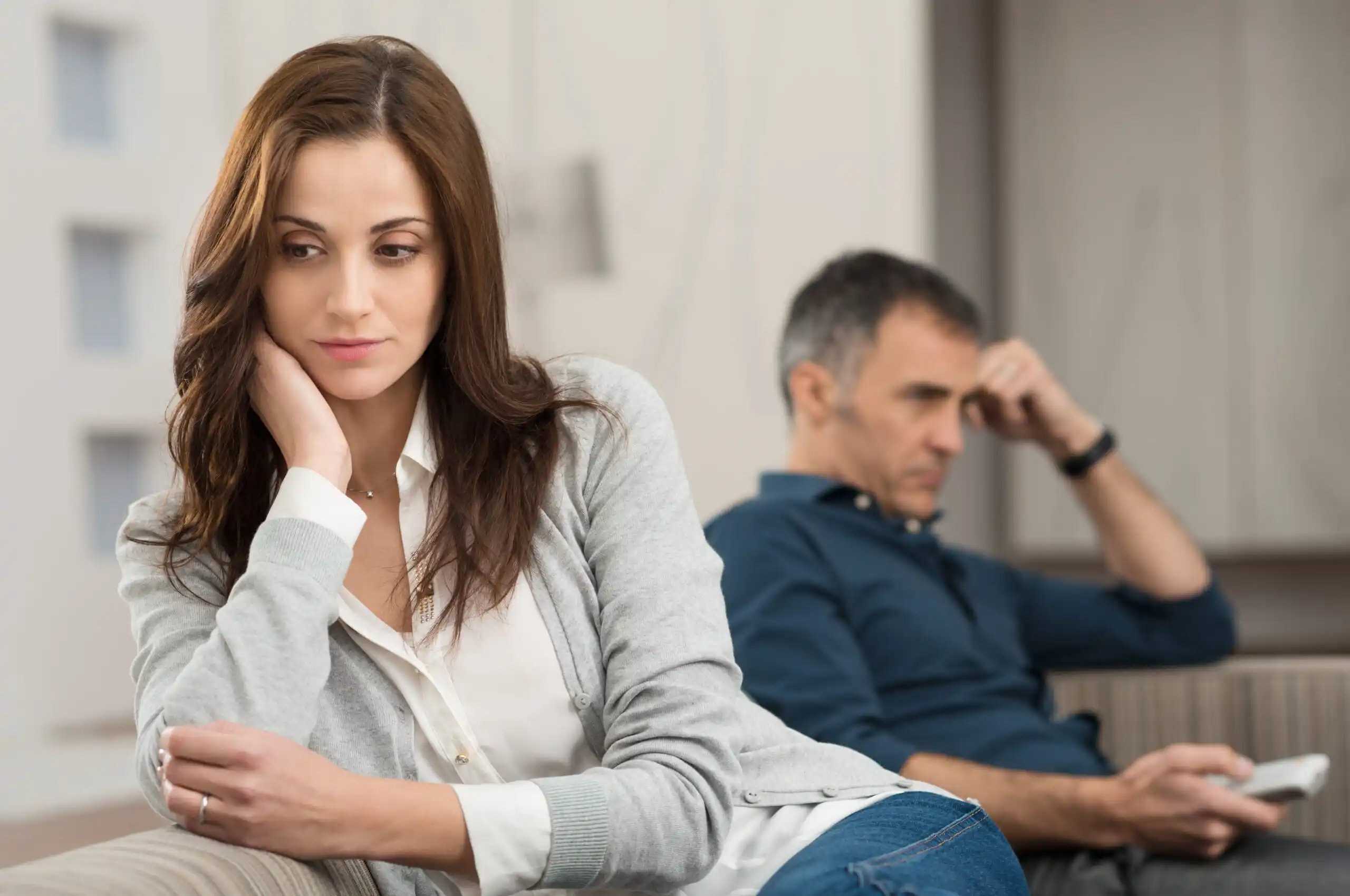 Separated Couple in Deep Thought About Tax Implications