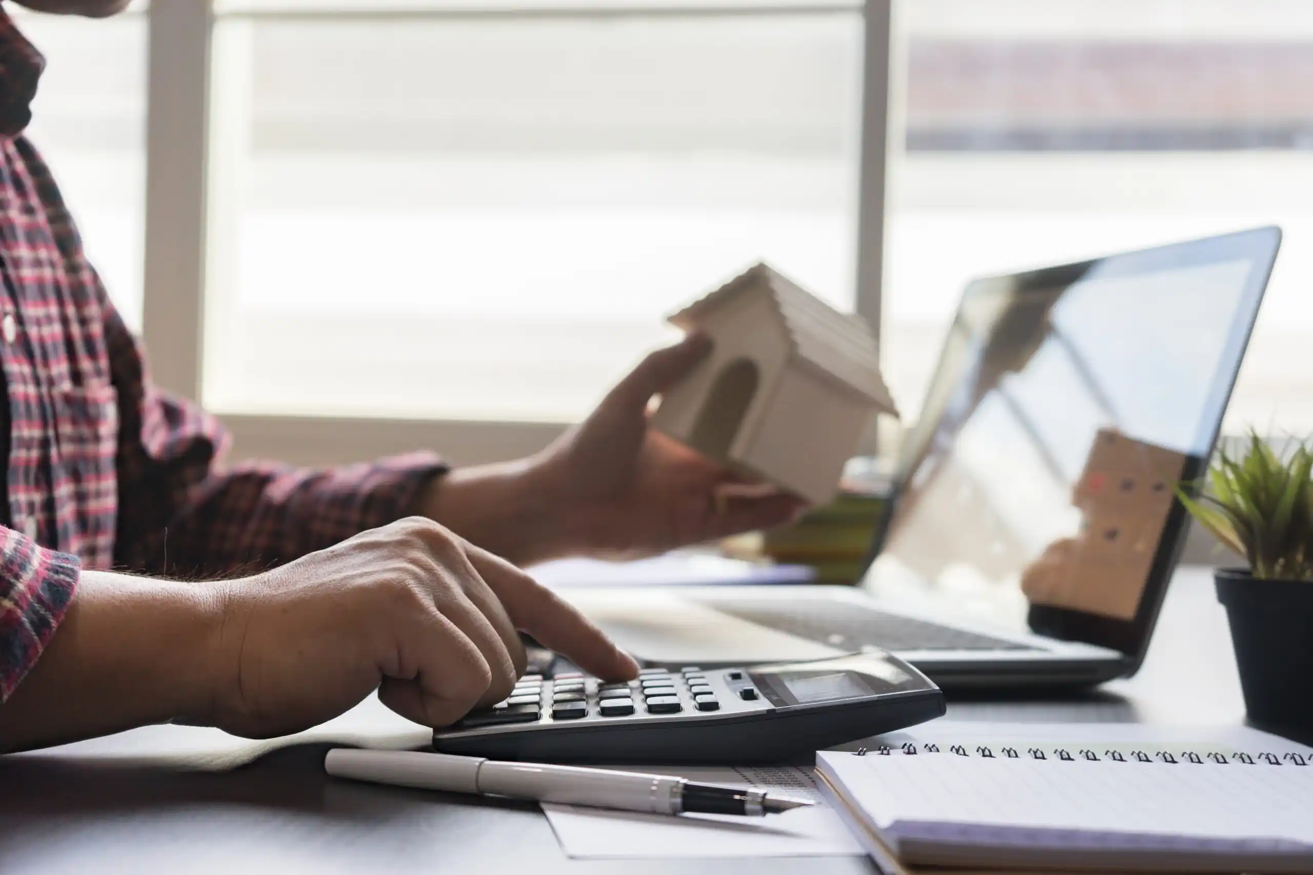 Man Calculating Mortgage