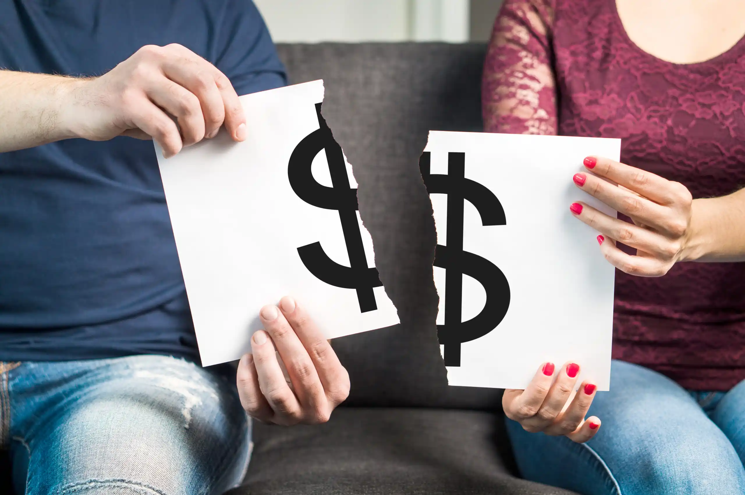 Couple with Money Sign Ripped in Half