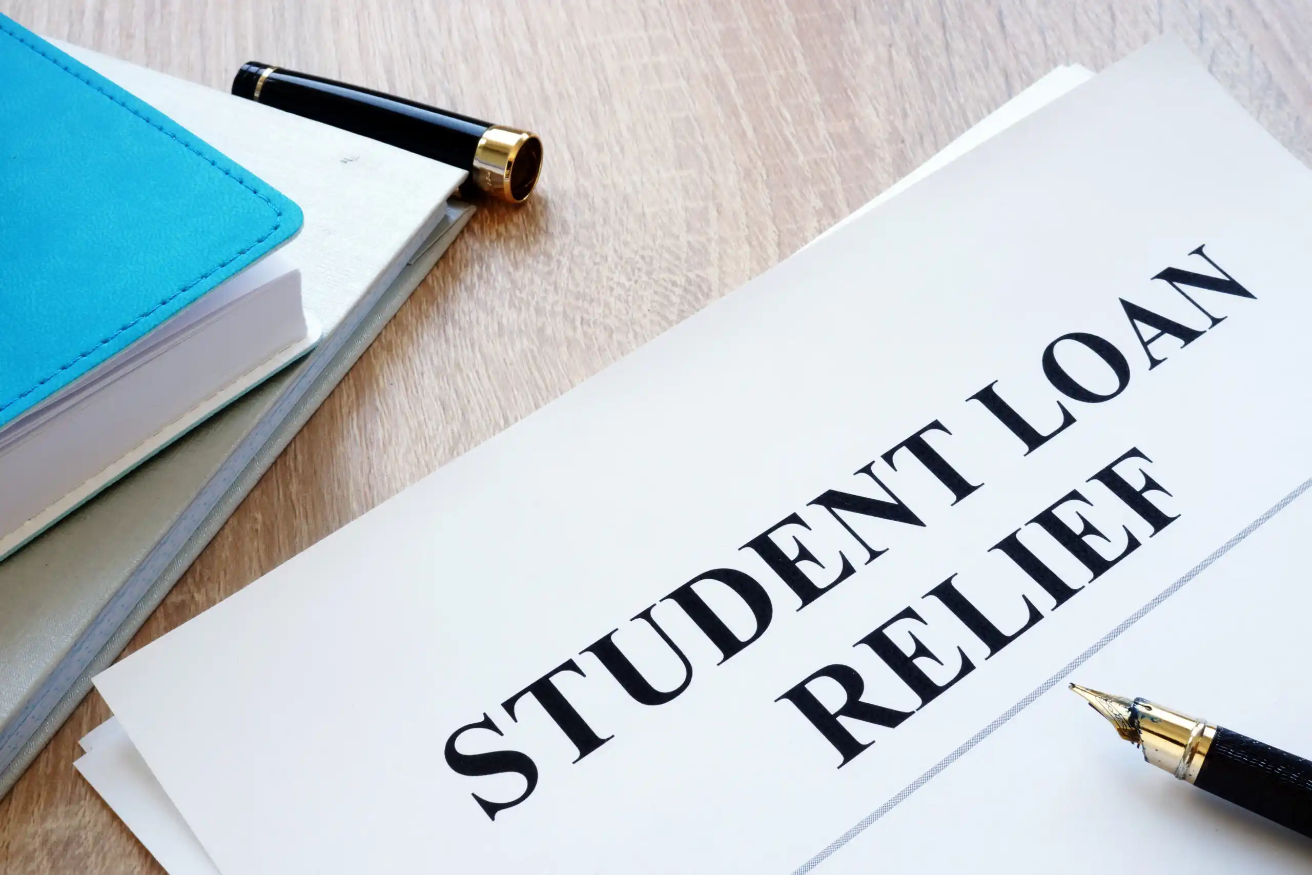 Student Loan Relief Application on Table