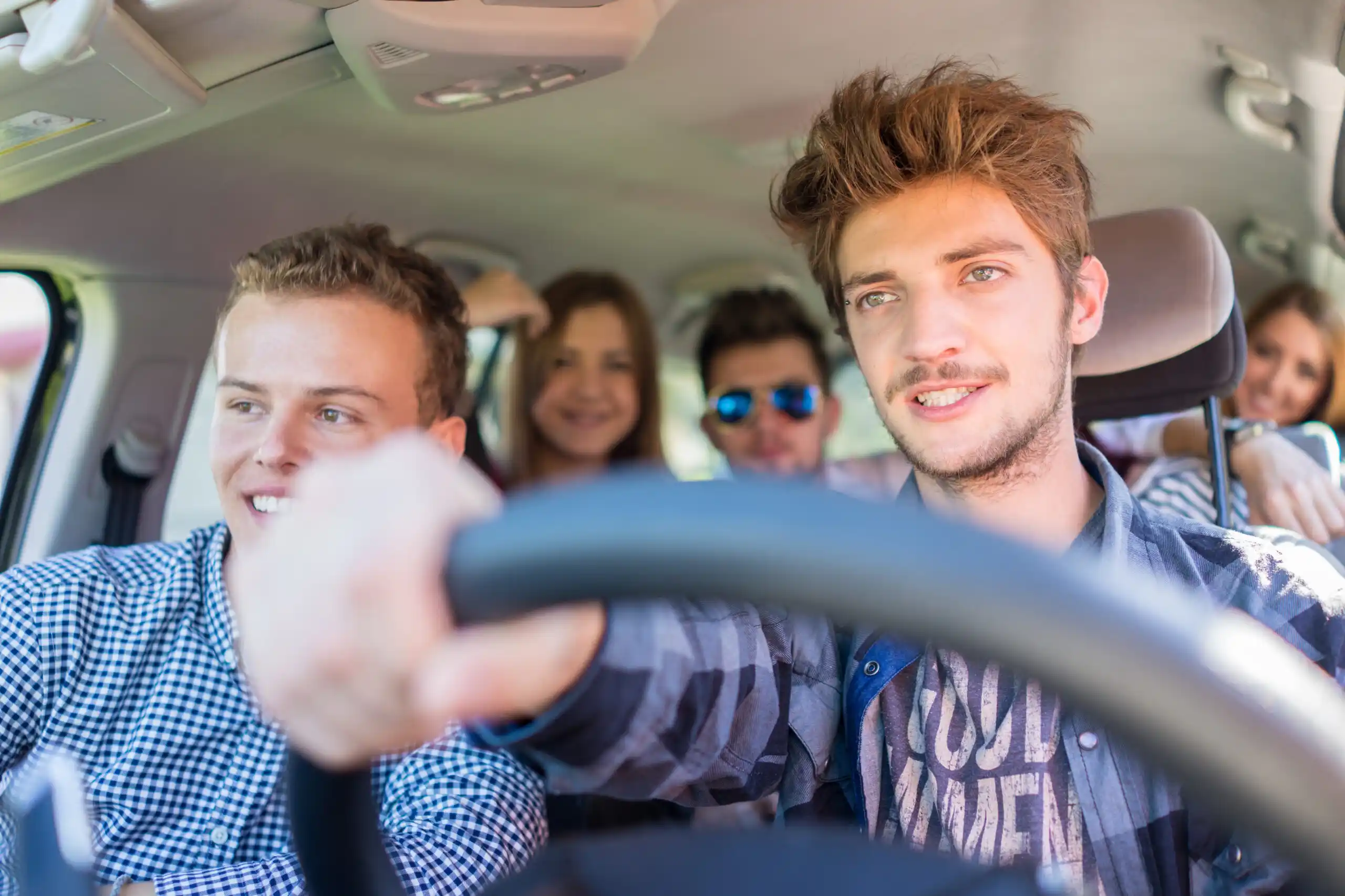 Teen driver with friends