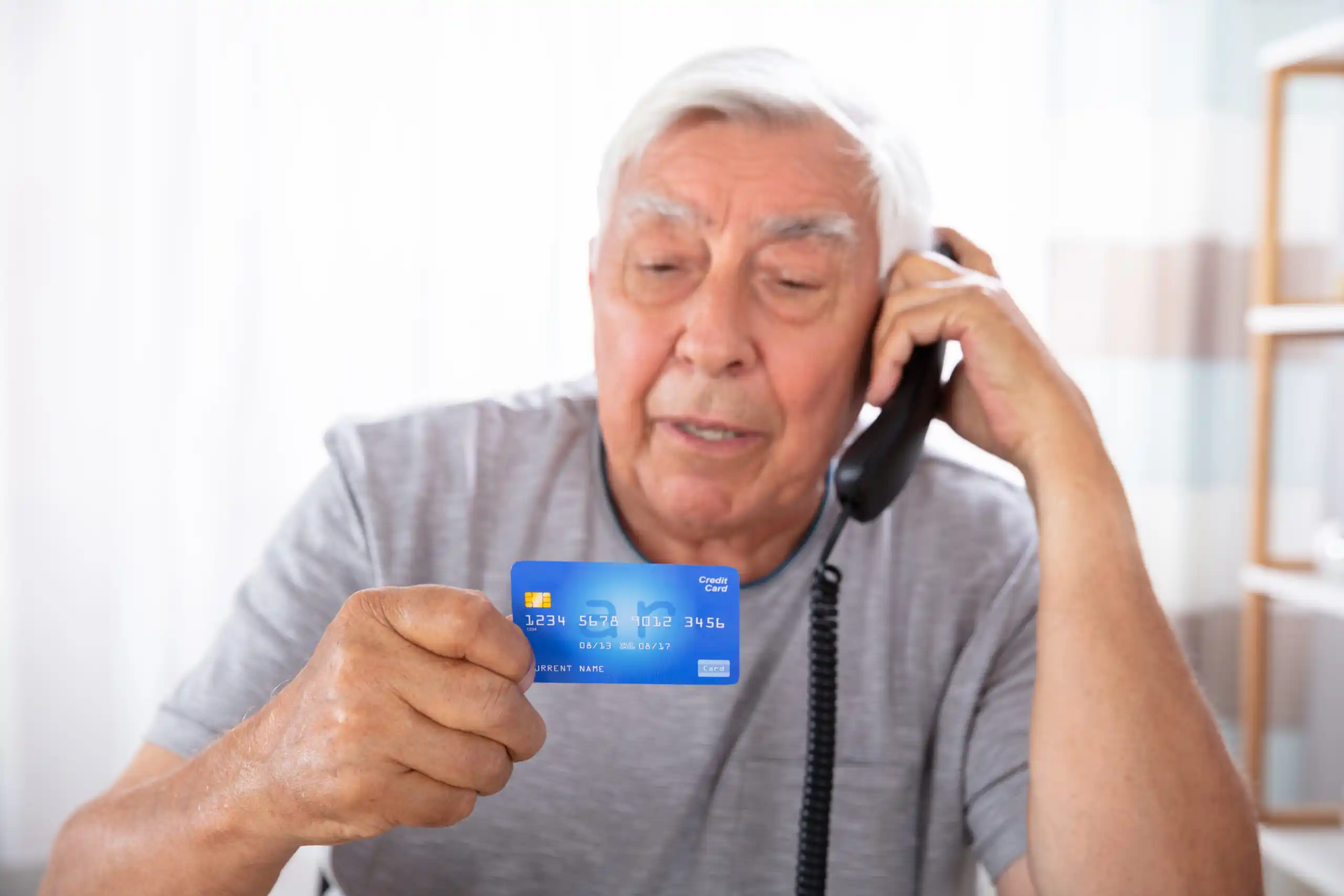 senior falling for credit card scam
