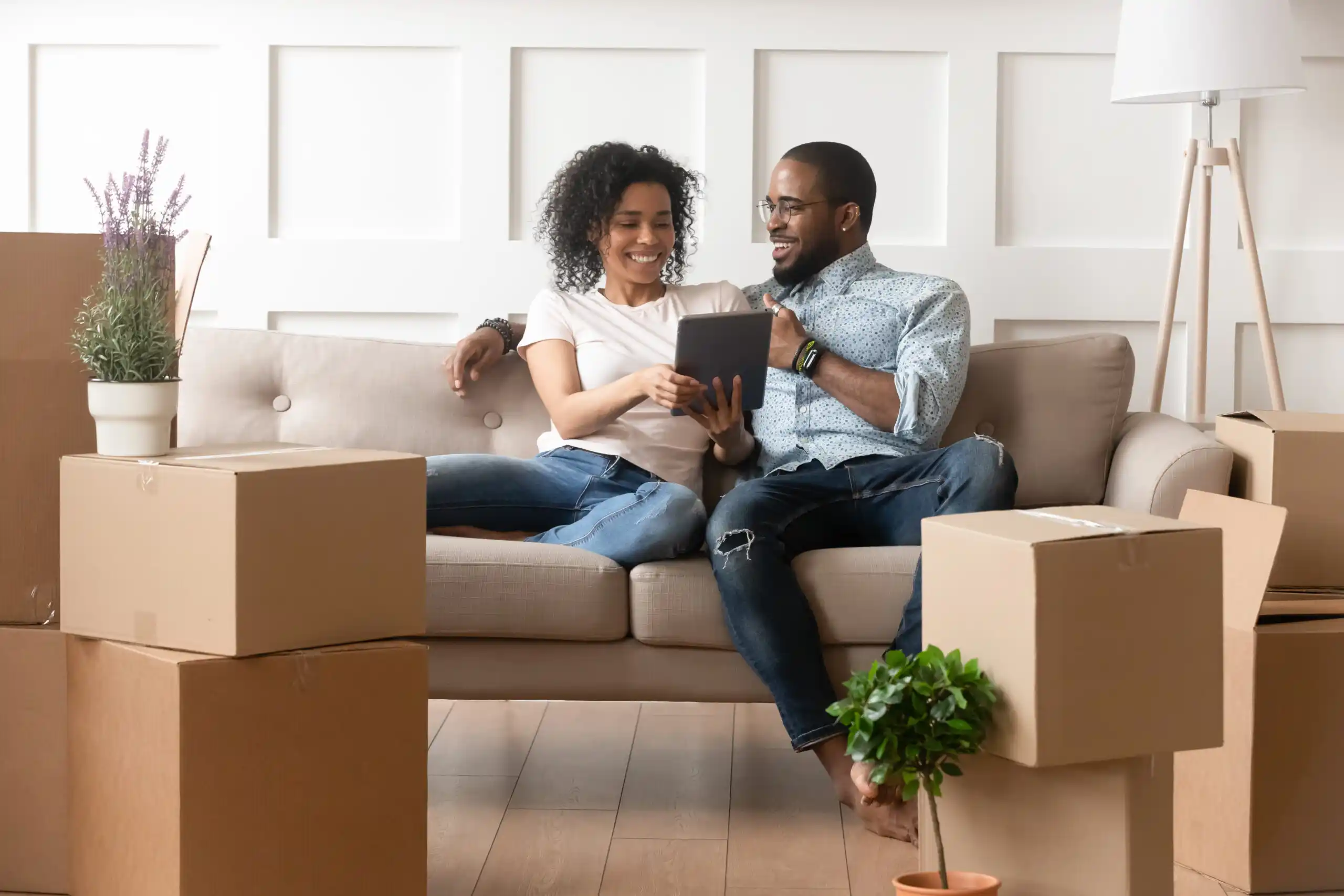 Young couple moving into their first apartment