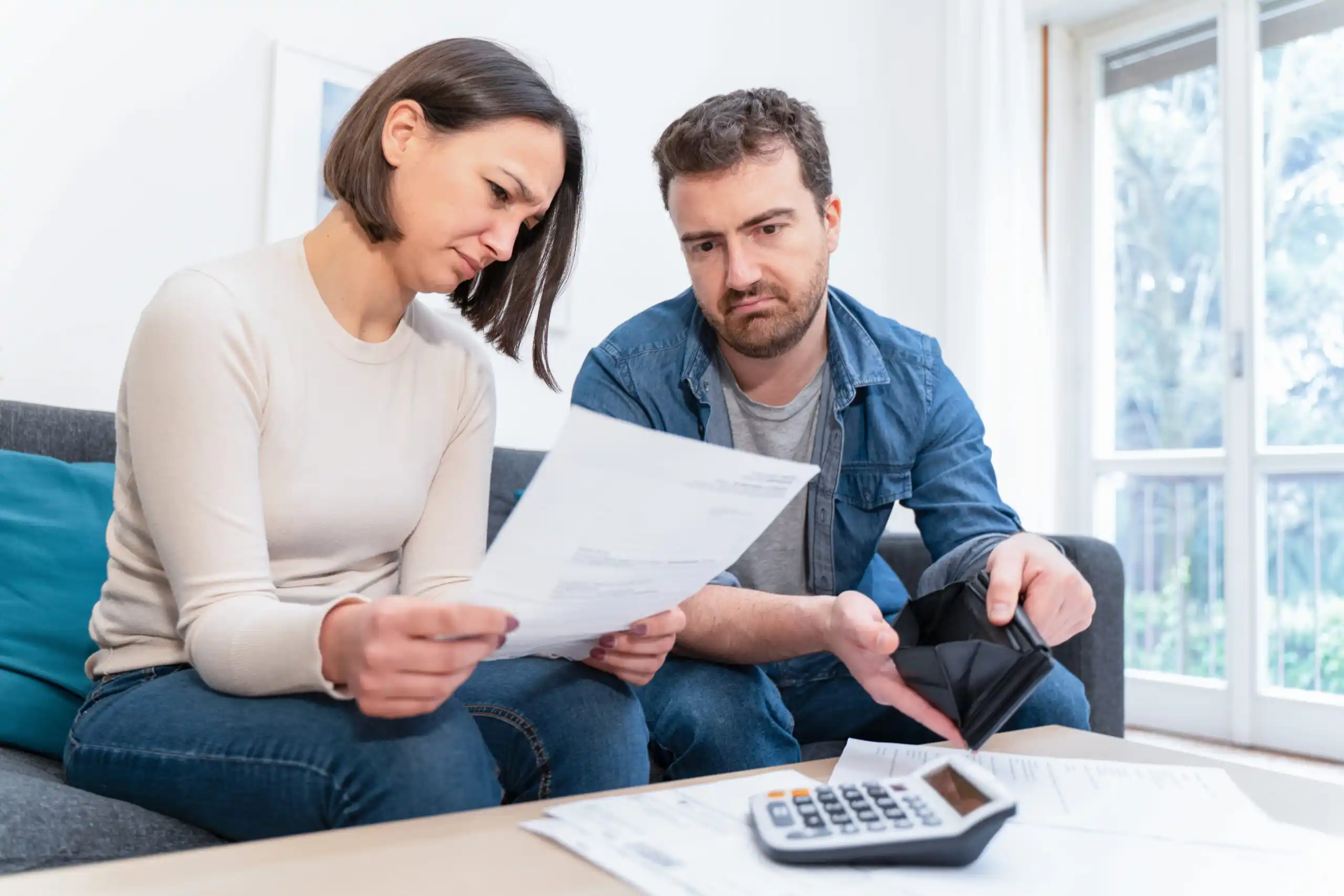 Young couple making a rental budget