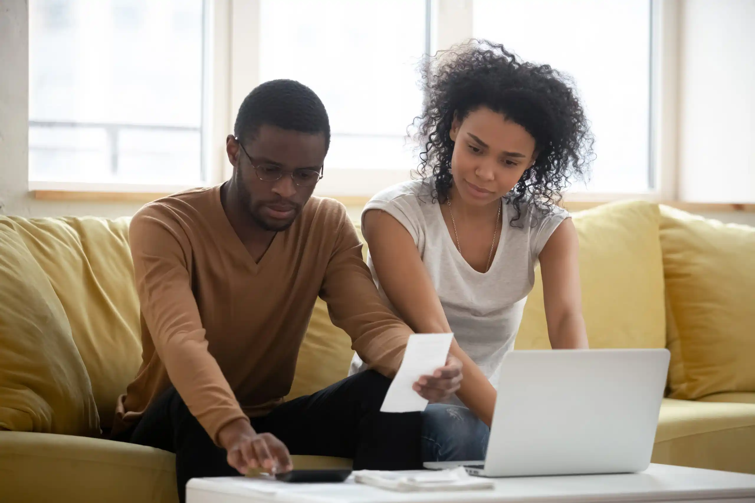 Couple examining their finances