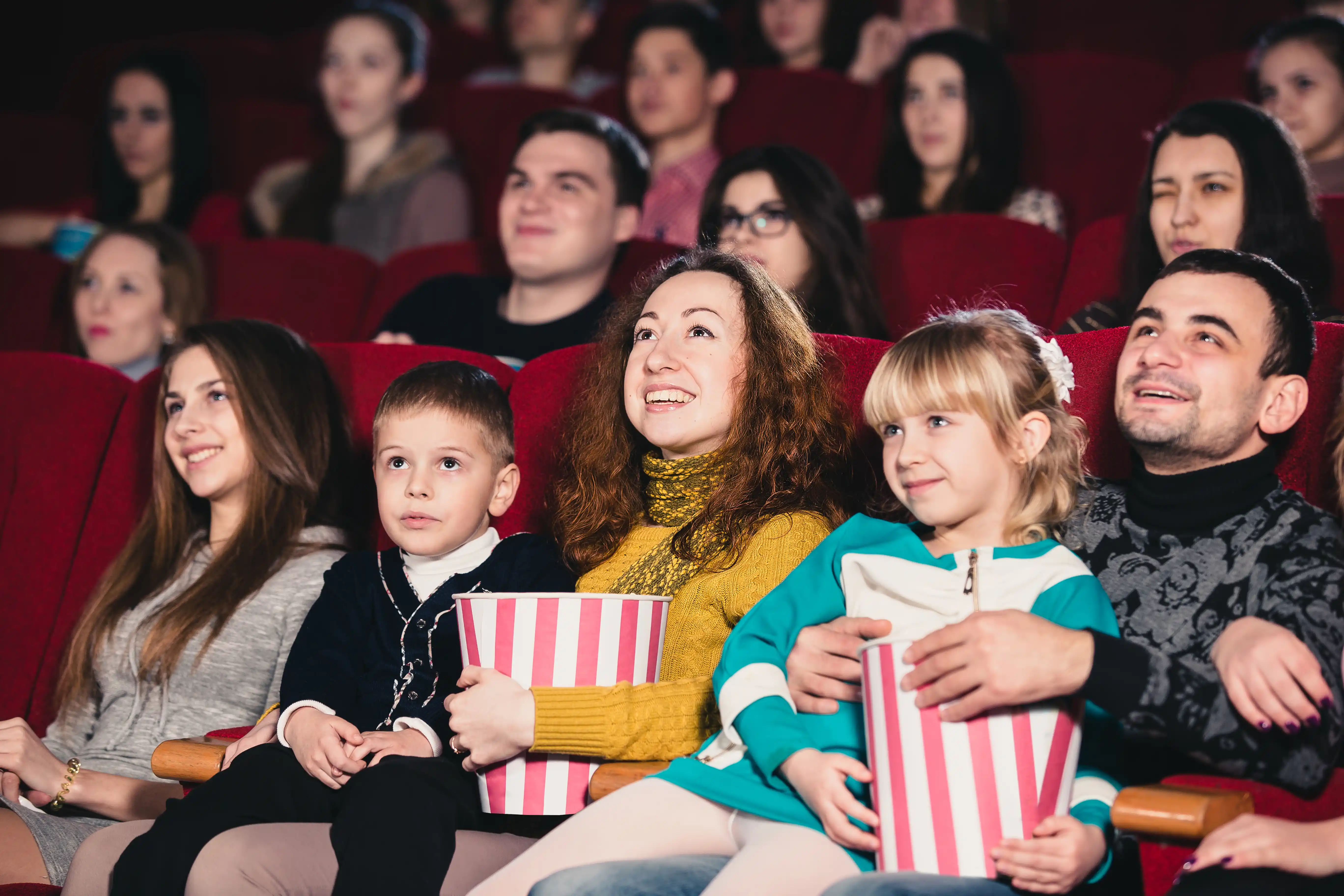 family at movie theater