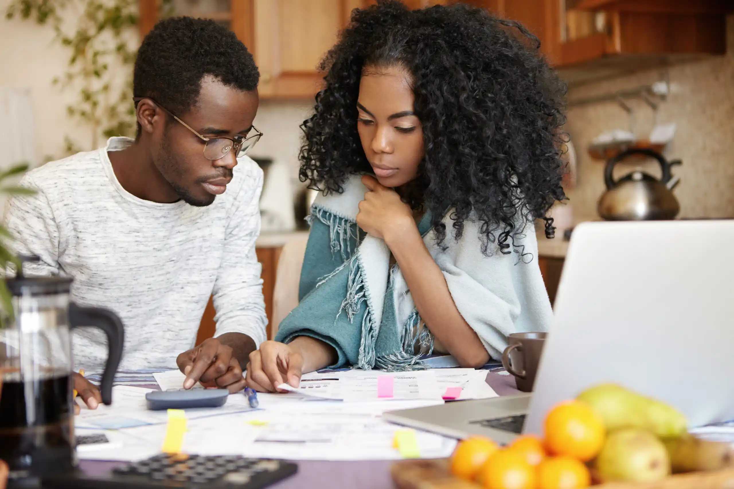 Couple balancing their budget