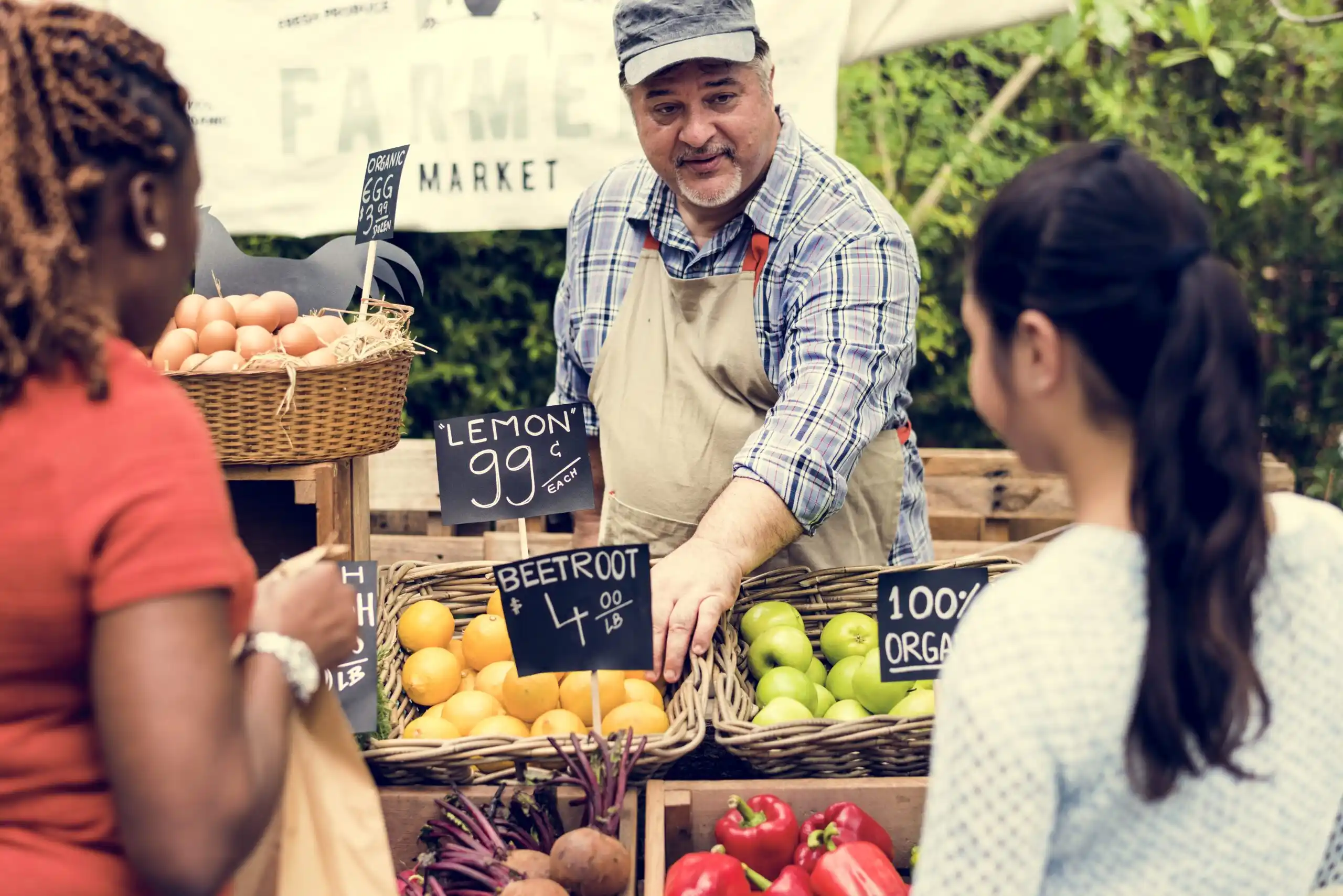 Farmer selling fruit at farmers' market