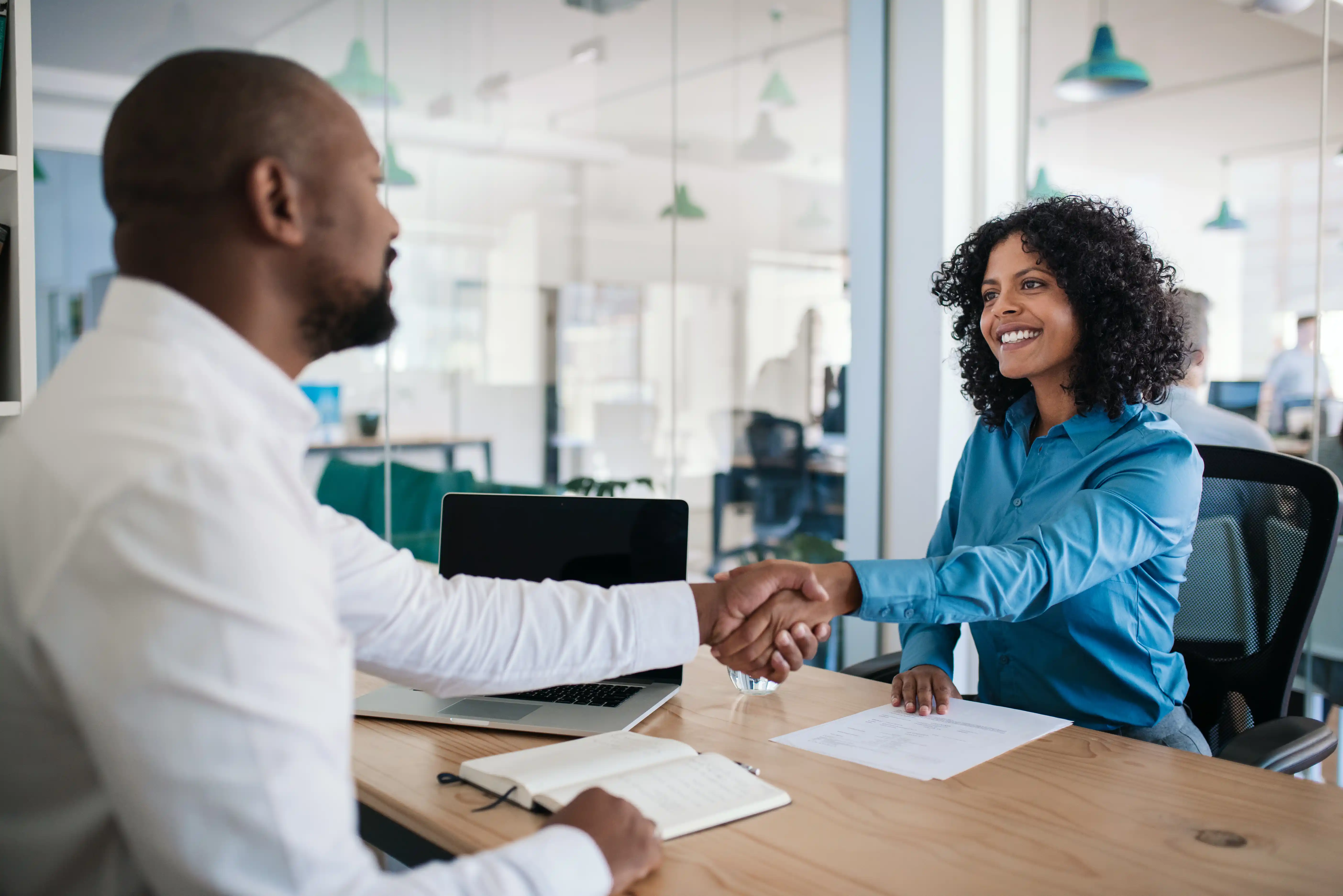 Young woman meeting with her boss