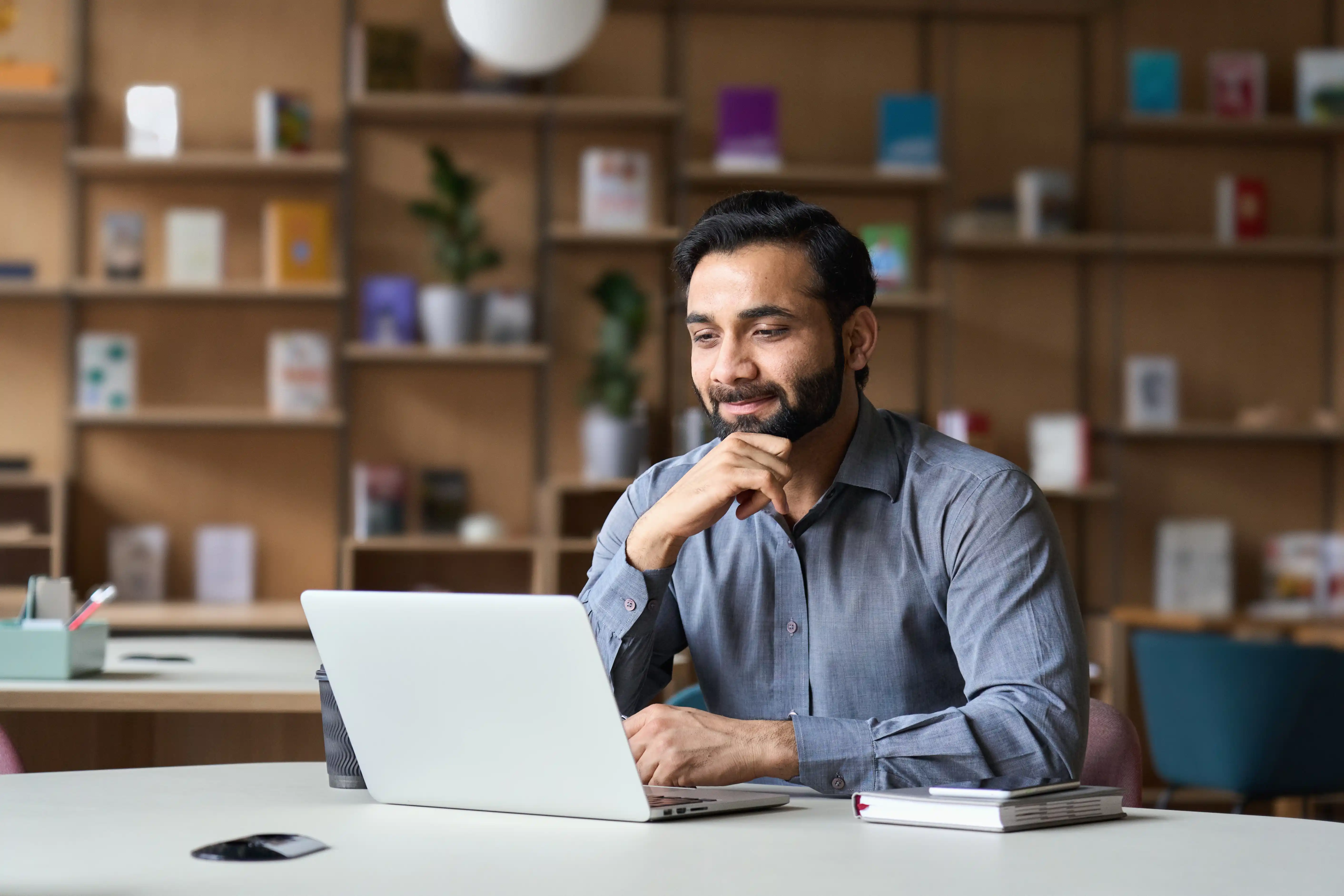 Young tech professional with vested interest in his company