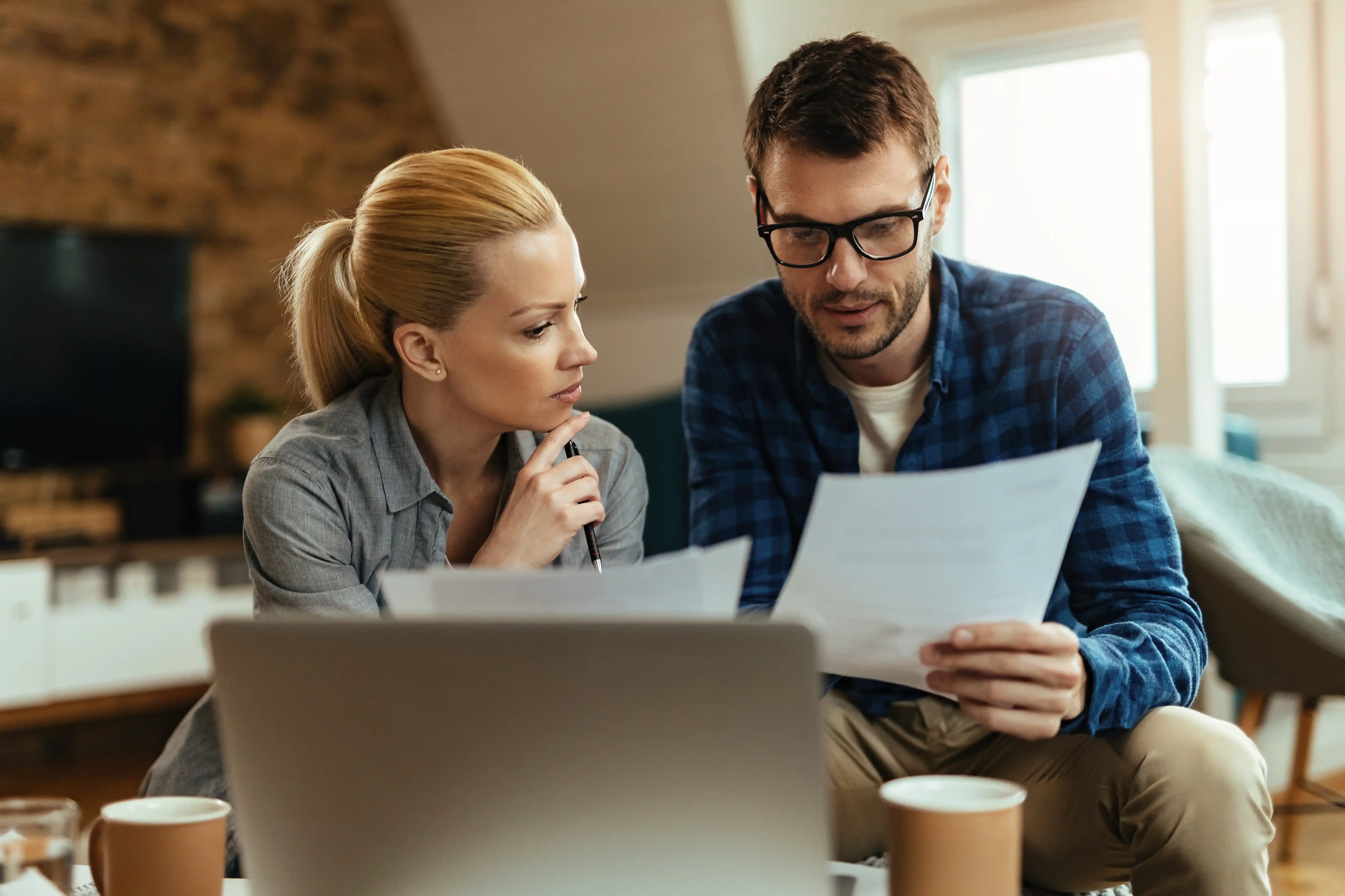 Young couple simplifying their finances