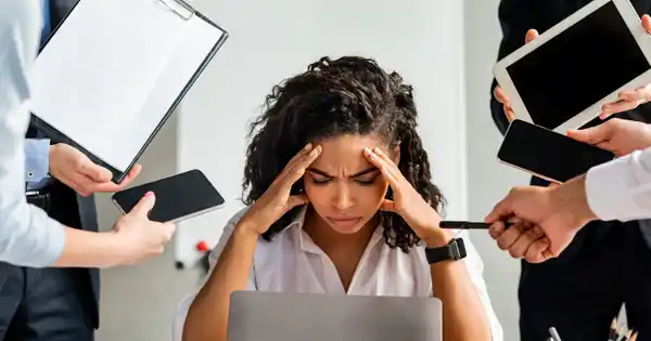 Woman stressed from overworking