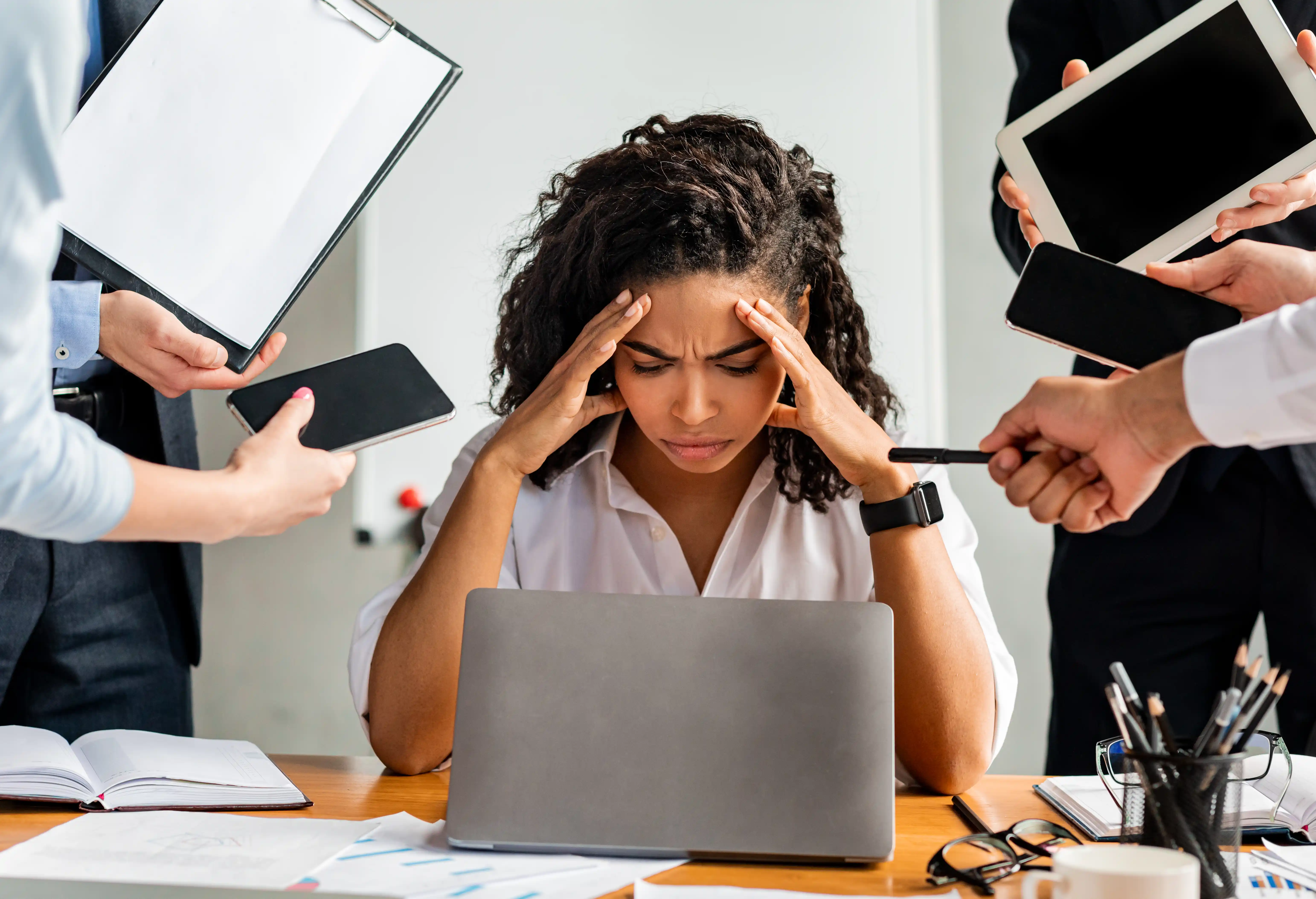 Woman stressed from overworking