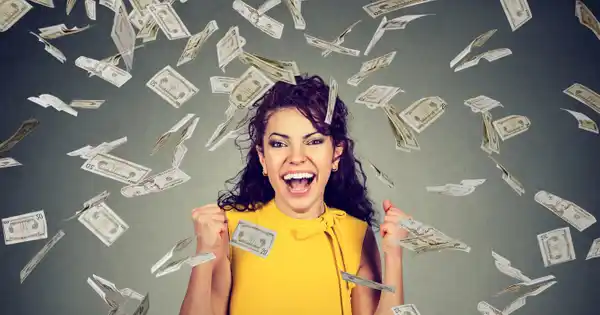 Woman enjoying a sudden windfall of money