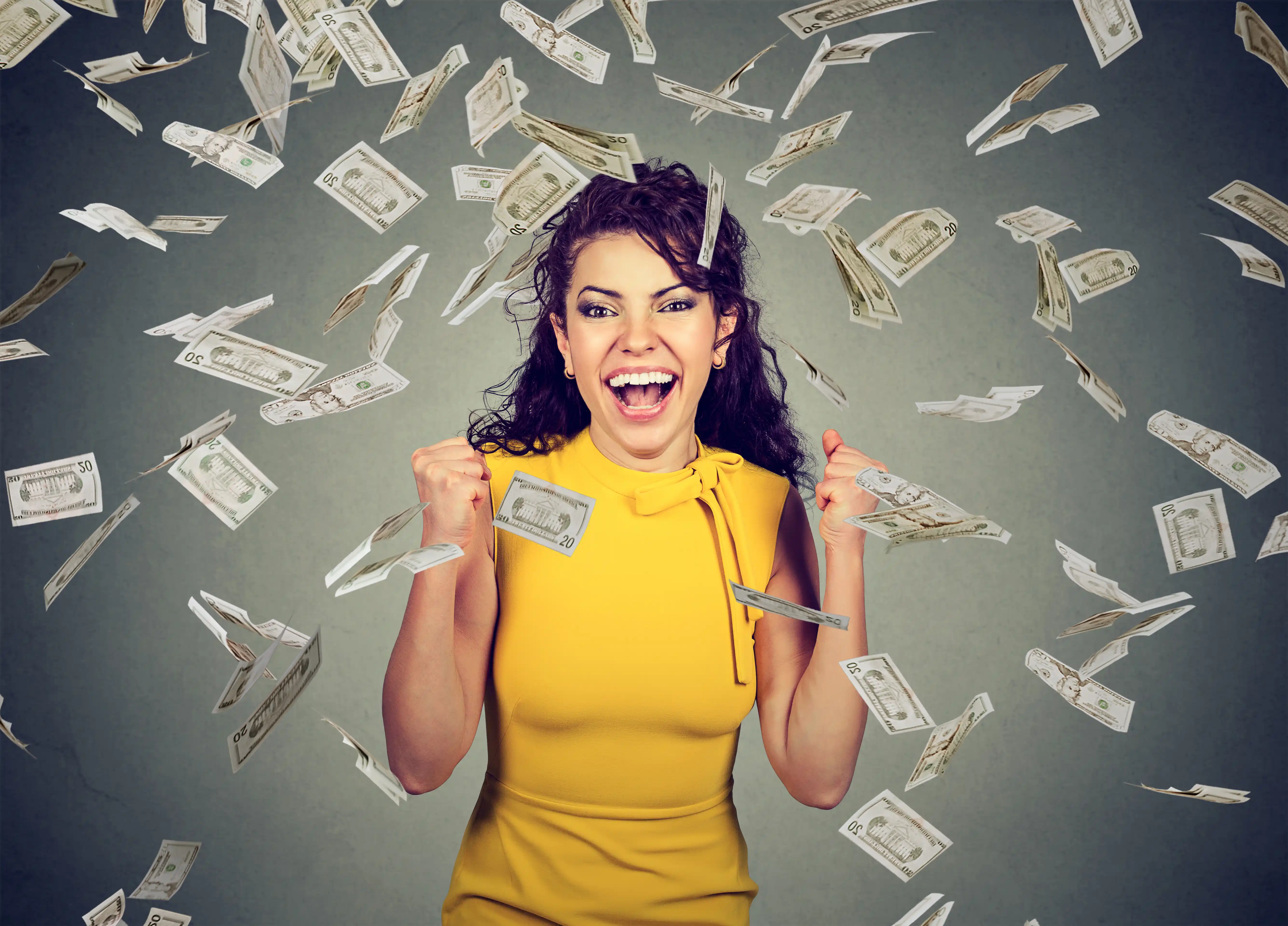 Woman enjoying a sudden windfall of money
